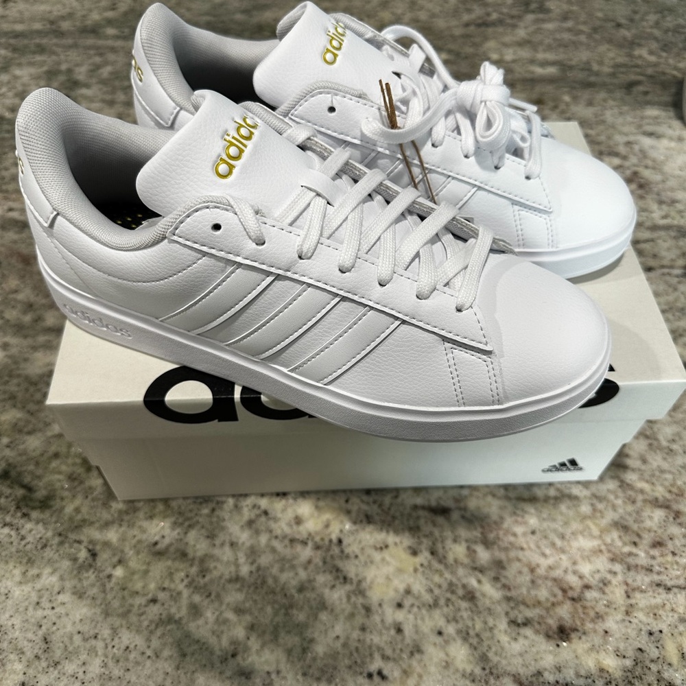 Adidas White Sneakers with Gold Accents